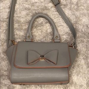 Small grey clutch with bow